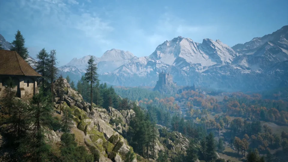 A wooded valley, mountain peaks and a hillside settlement fill the landscape.