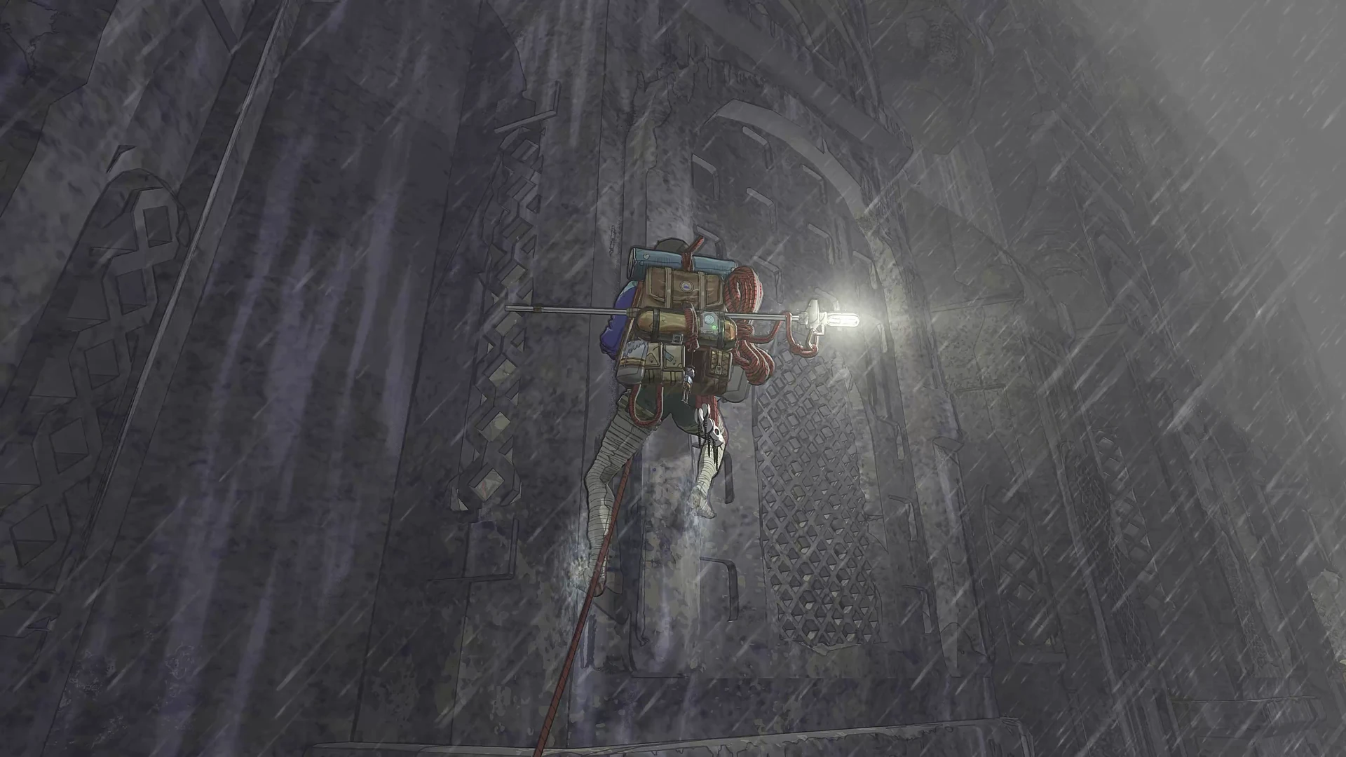 Official Cairn screenshot of Aava climbing a carved stone wall in heavy rain, her headlamp lit and a rope hanging below her.